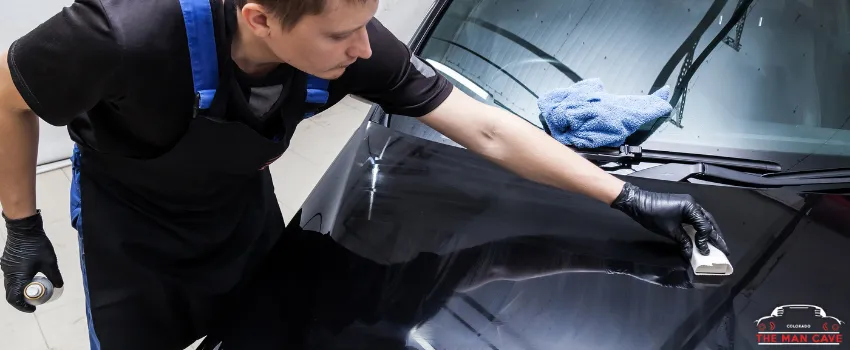 TMC - Man applying ceramic coating on the car's hood